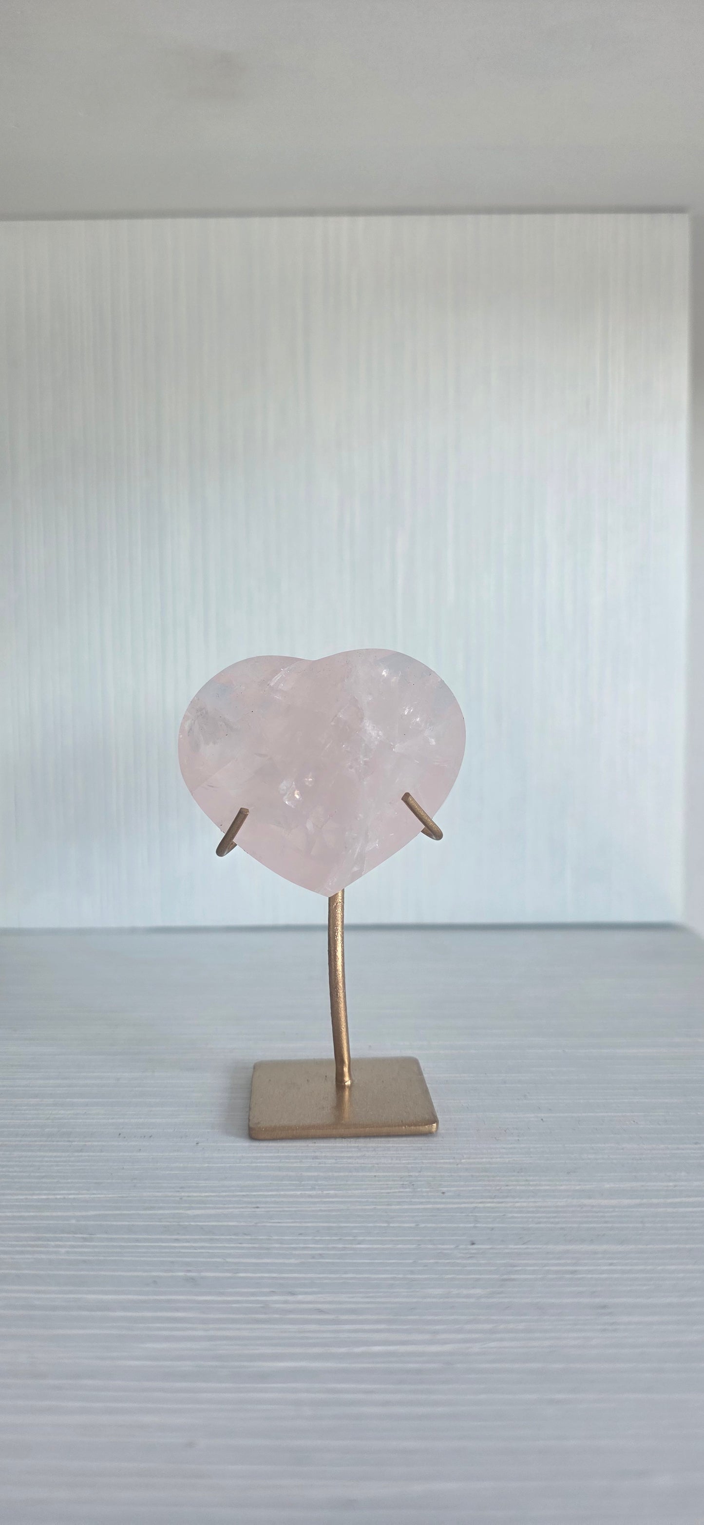 Brazilian Rose Quartz faceted heart on stand
