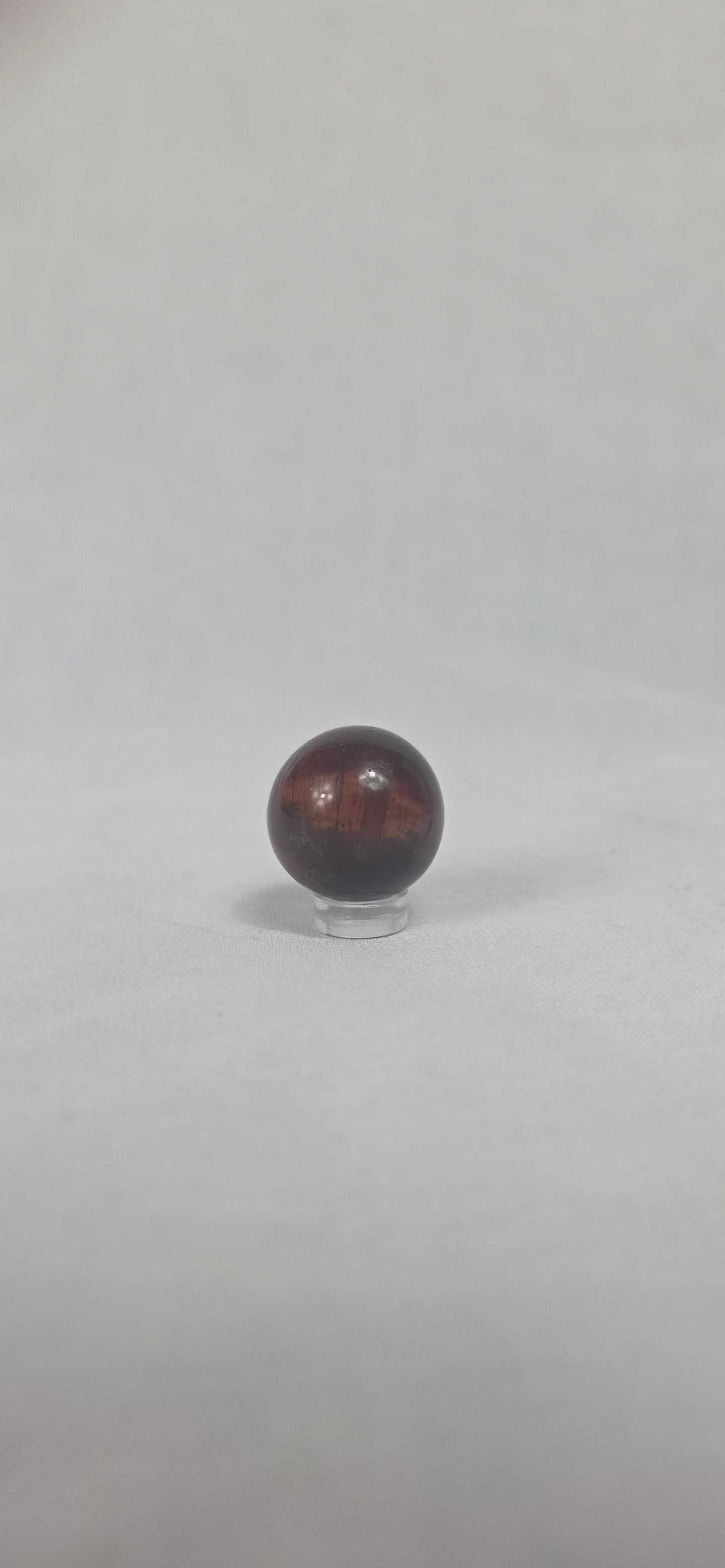 Red Tigers eye sphere