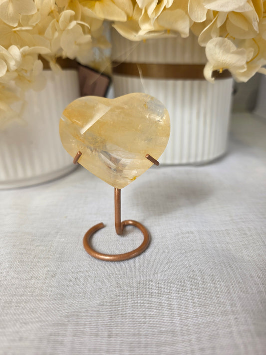 Brazilian golden healer faceted heart carving