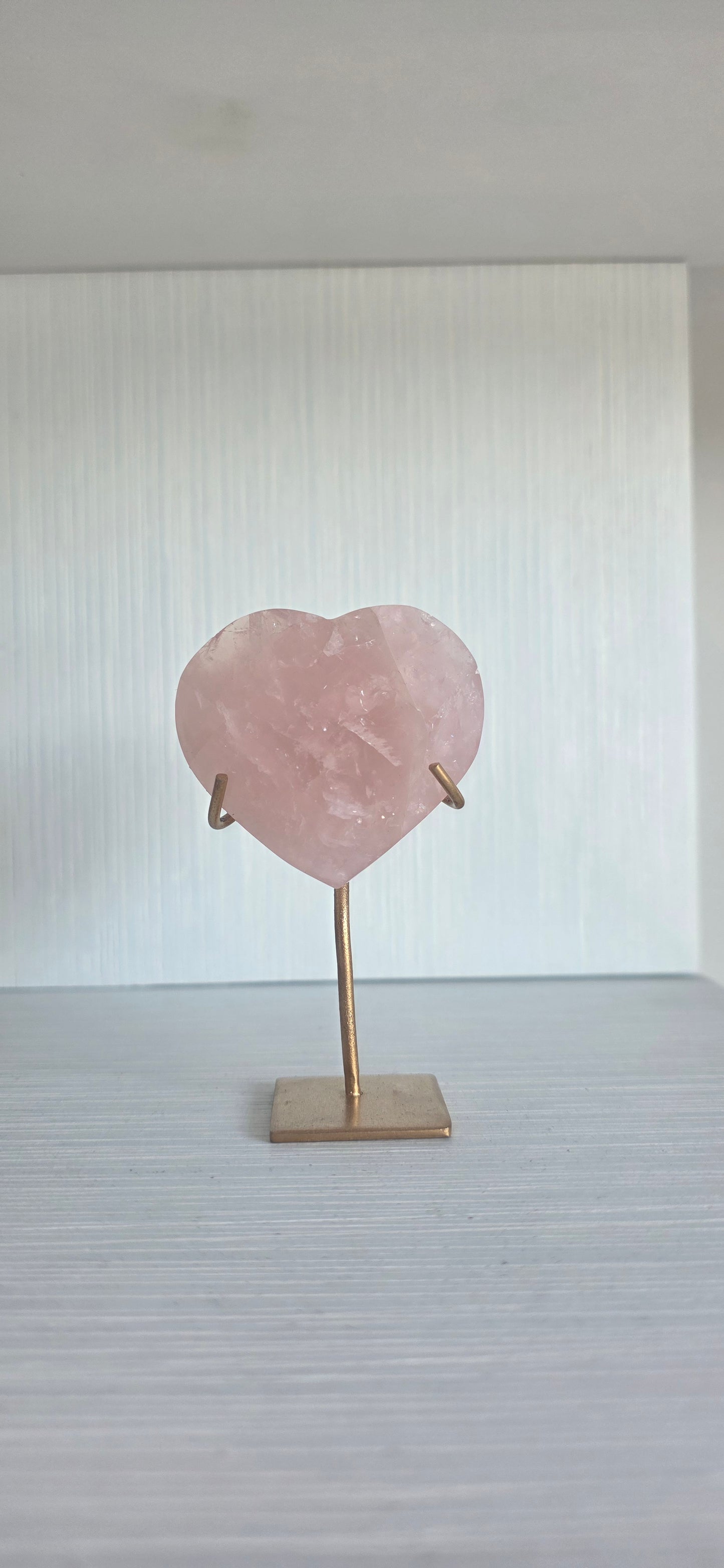 Brazilian Rose Quartz faceted heart on stand