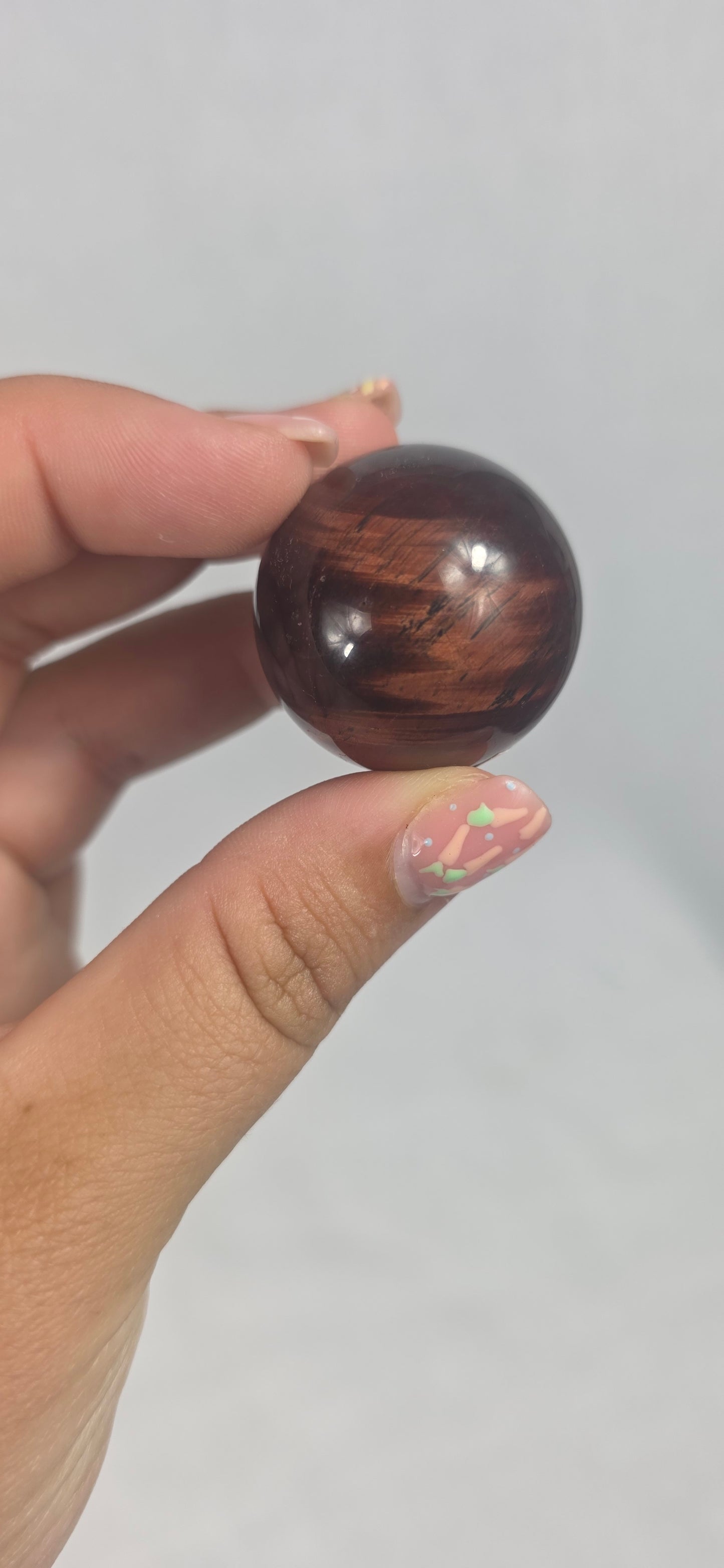 Red Tigers eye sphere